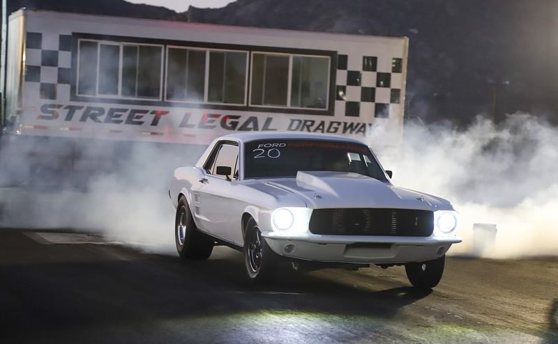 White classic Mustang racing on Street Legal Dragway